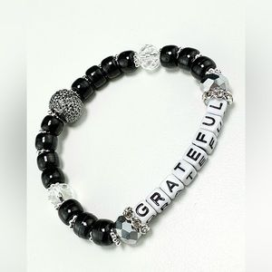 Black and white grateful bracelet